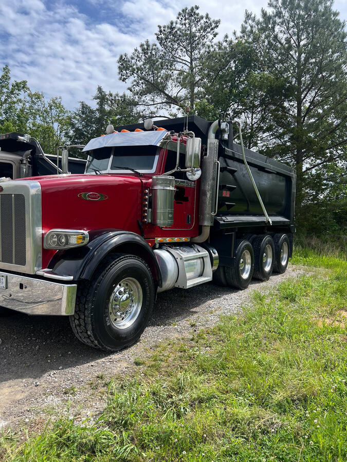 Washing peterbilt dump truck by shiny side up truck wash